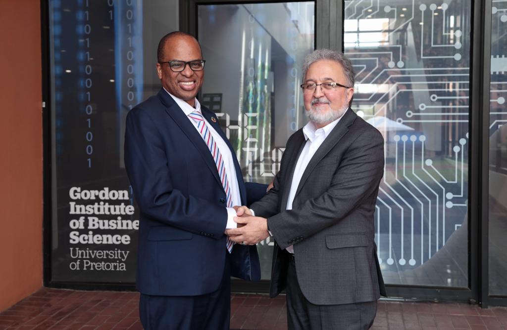 GIBS's Dean, Professor Morris Mthombeni with Economic Modelling Academy co-director, Dr. Asghar Adelzadeh at the announcement of their partnership to offer executive economic modelling courses to the nations leaders and decision-makers.